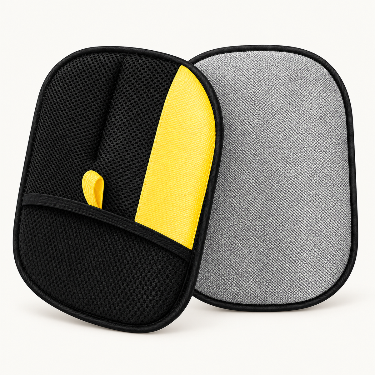 Studio presentation showing the mesh back and grey cleaning face of the pet-hair removal glove